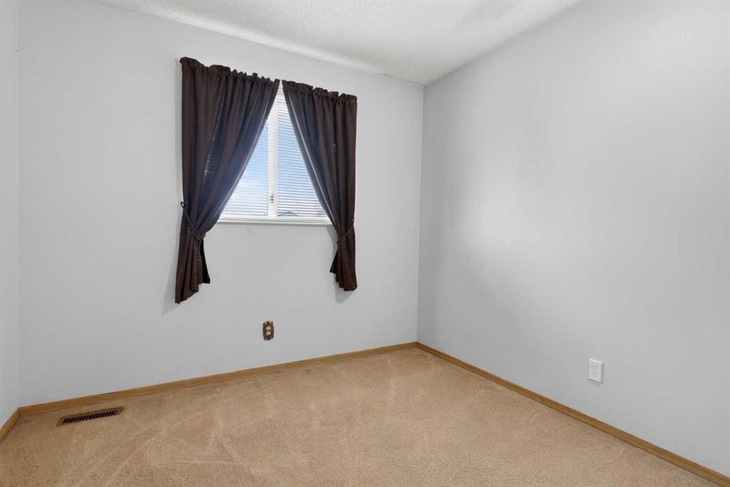 147 Martindale Drive Ne, Calgary, AB - Indoor Photo Showing Other Room