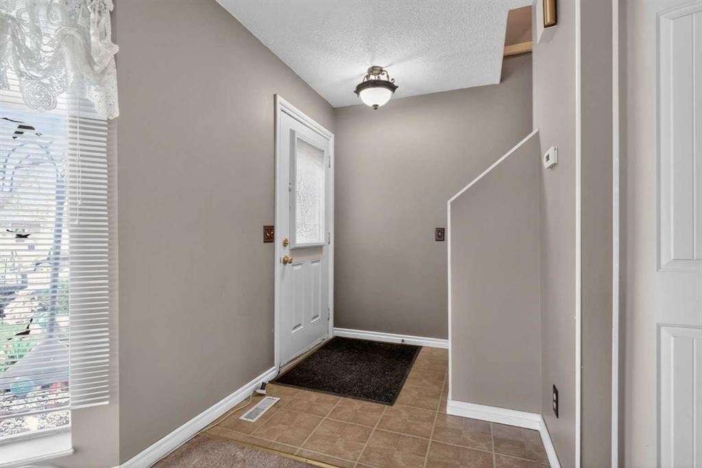 147 Martindale Drive Ne, Calgary, AB - Indoor Photo Showing Other Room