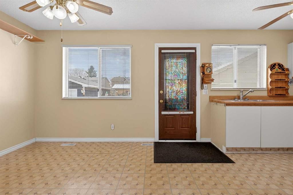 147 Martindale Drive Ne, Calgary, AB - Indoor Photo Showing Other Room
