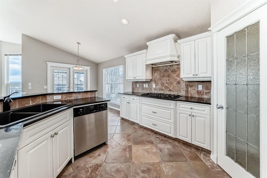 35 Arbour Vista Way Nw, Calgary, AB - Indoor Photo Showing Kitchen With Double Sink