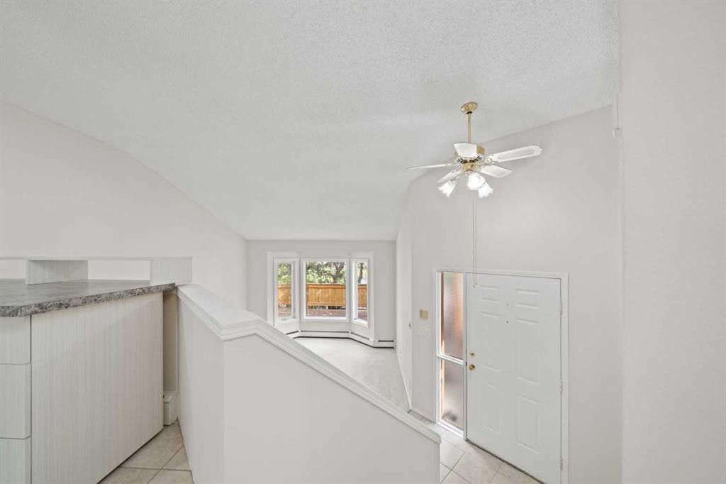 107 Tararidge Close Ne, Calgary, AB - Indoor Photo Showing Other Room