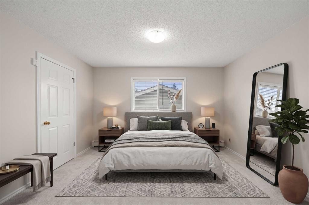 107 Tararidge Close Ne, Calgary, AB - Indoor Photo Showing Bedroom