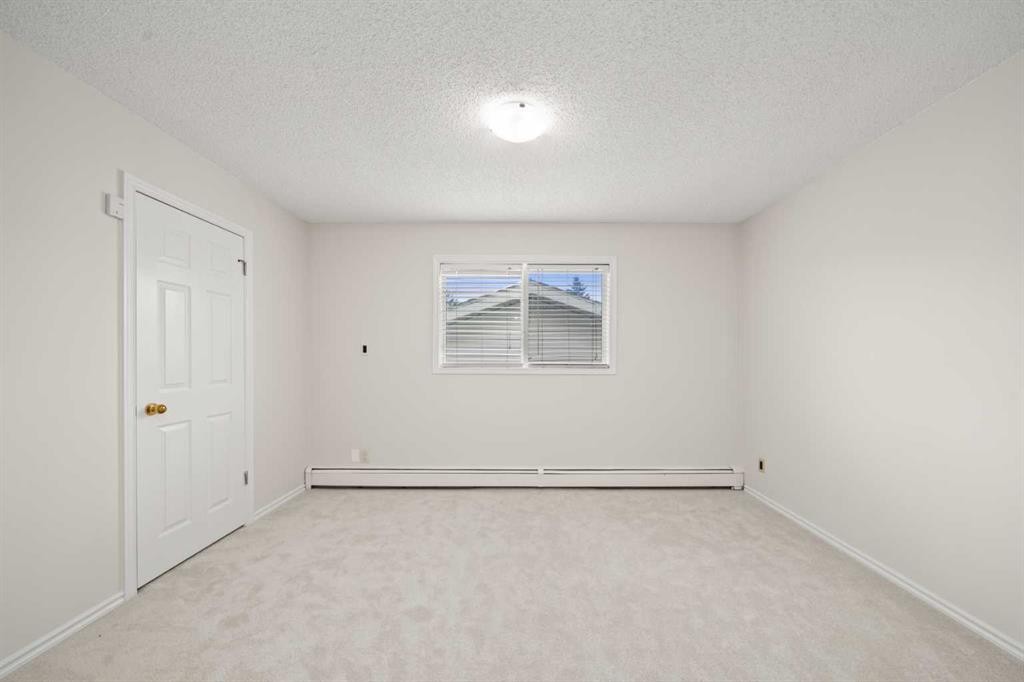 107 Tararidge Close Ne, Calgary, AB - Indoor Photo Showing Other Room