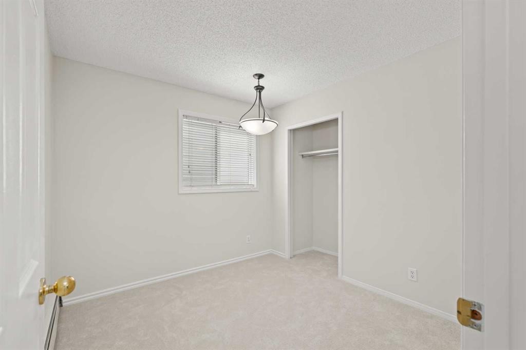 107 Tararidge Close Ne, Calgary, AB - Indoor Photo Showing Other Room