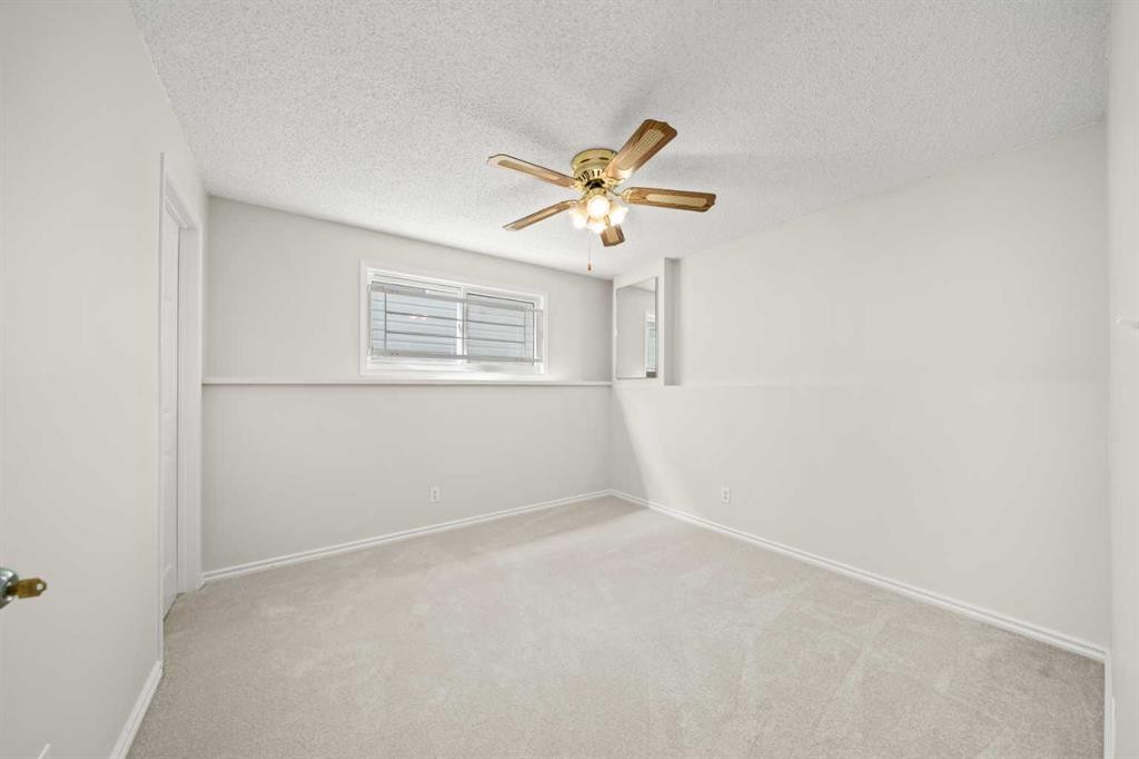 107 Tararidge Close Ne, Calgary, AB - Indoor Photo Showing Other Room