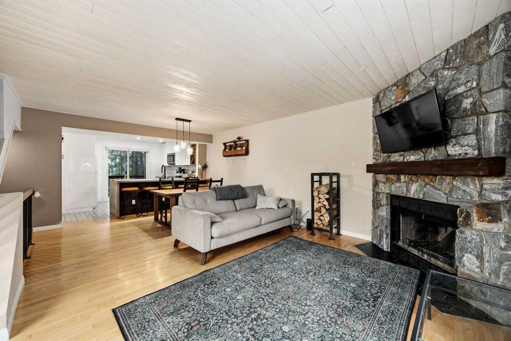 1-1061 Evergreen Circle, Canmore, AB - Indoor Photo Showing Living Room With Fireplace