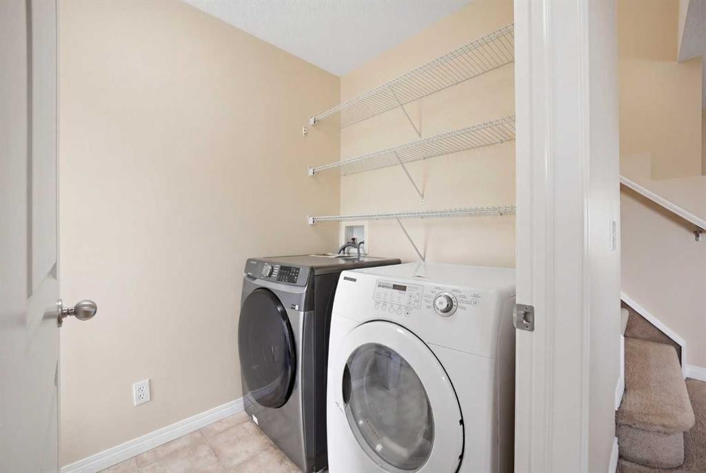 35 Saddlebrook Link Ne, Calgary, AB - Indoor Photo Showing Laundry Room