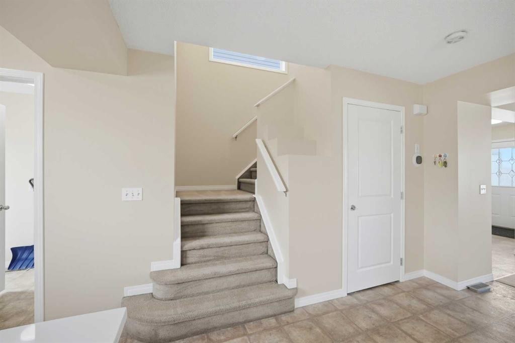 35 Saddlebrook Link Ne, Calgary, AB - Indoor Photo Showing Other Room
