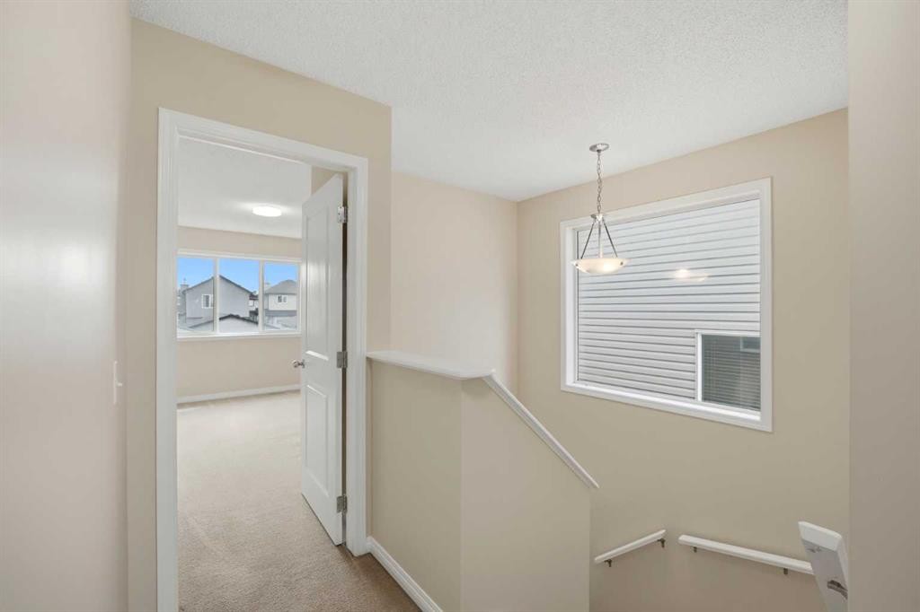 35 Saddlebrook Link Ne, Calgary, AB - Indoor Photo Showing Other Room