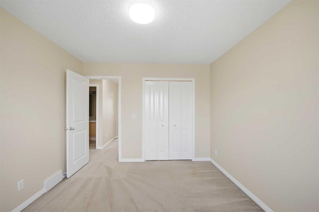 35 Saddlebrook Link Ne, Calgary, AB - Indoor Photo Showing Other Room