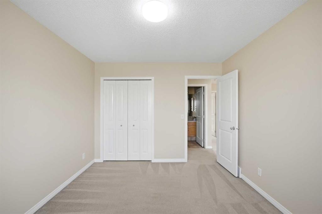 35 Saddlebrook Link Ne, Calgary, AB - Indoor Photo Showing Other Room