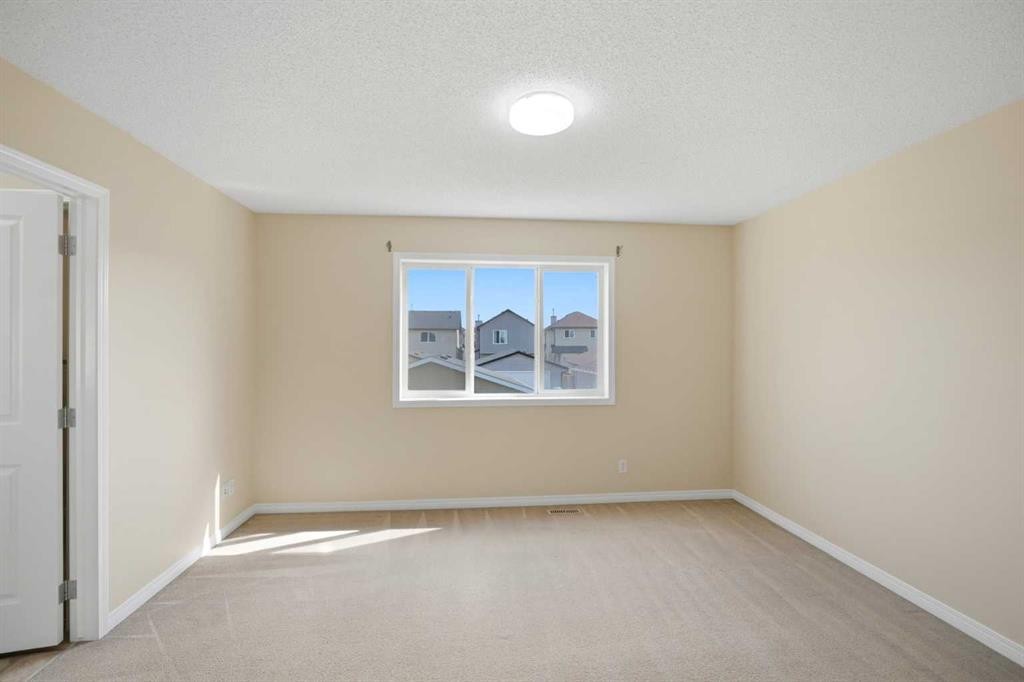 35 Saddlebrook Link Ne, Calgary, AB - Indoor Photo Showing Other Room
