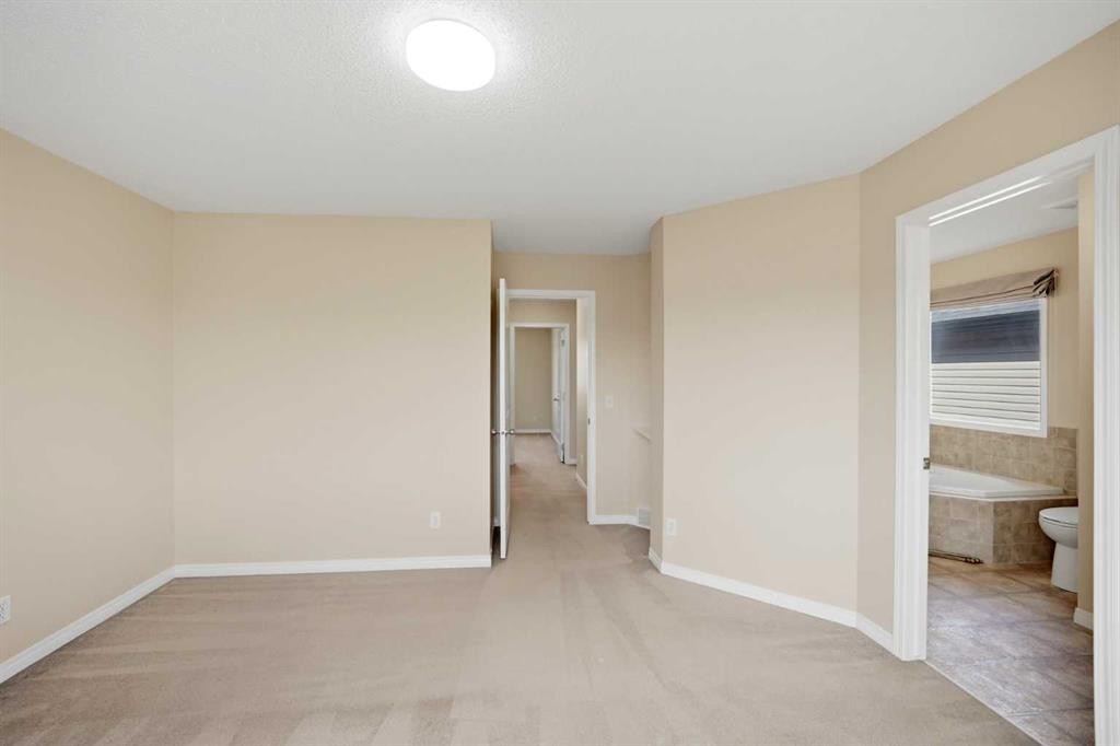 35 Saddlebrook Link Ne, Calgary, AB - Indoor Photo Showing Other Room