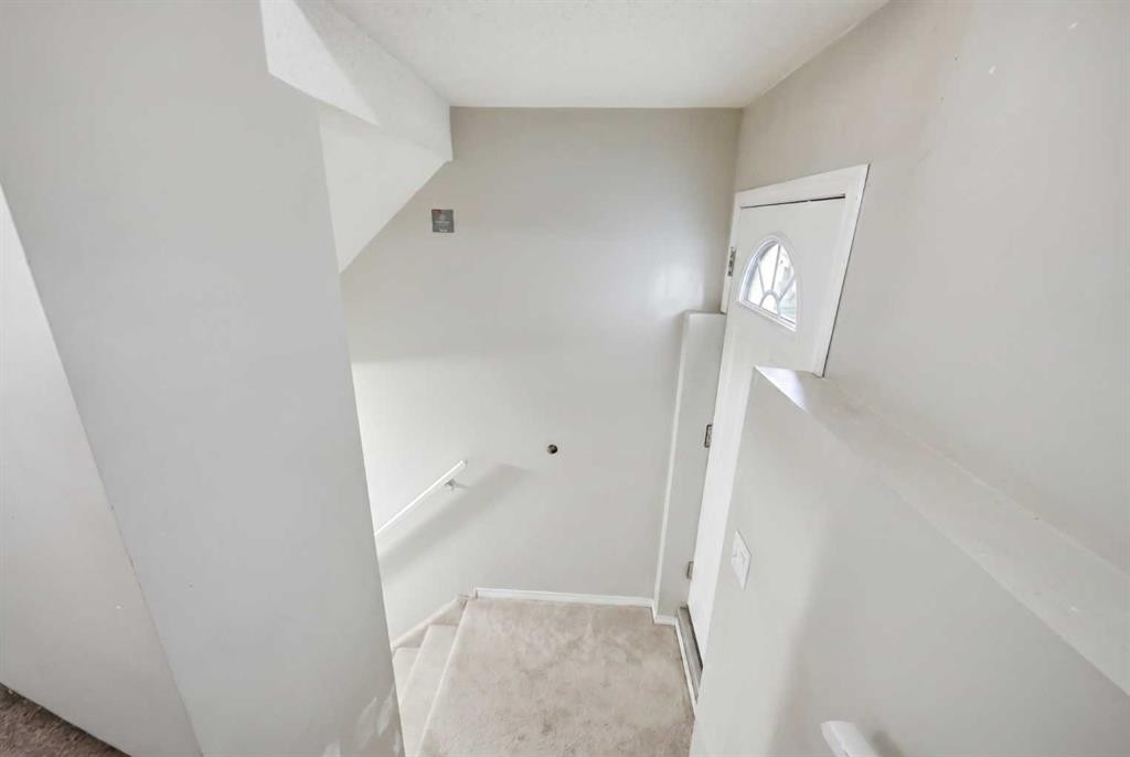 35 Saddlebrook Link Ne, Calgary, AB - Indoor Photo Showing Other Room