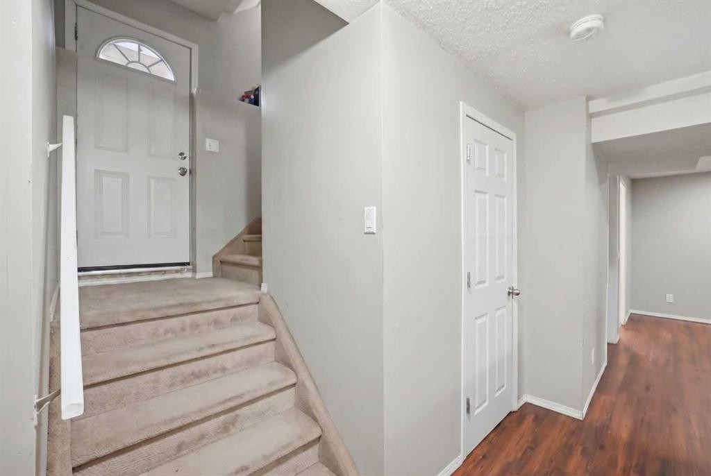 35 Saddlebrook Link Ne, Calgary, AB - Indoor Photo Showing Other Room