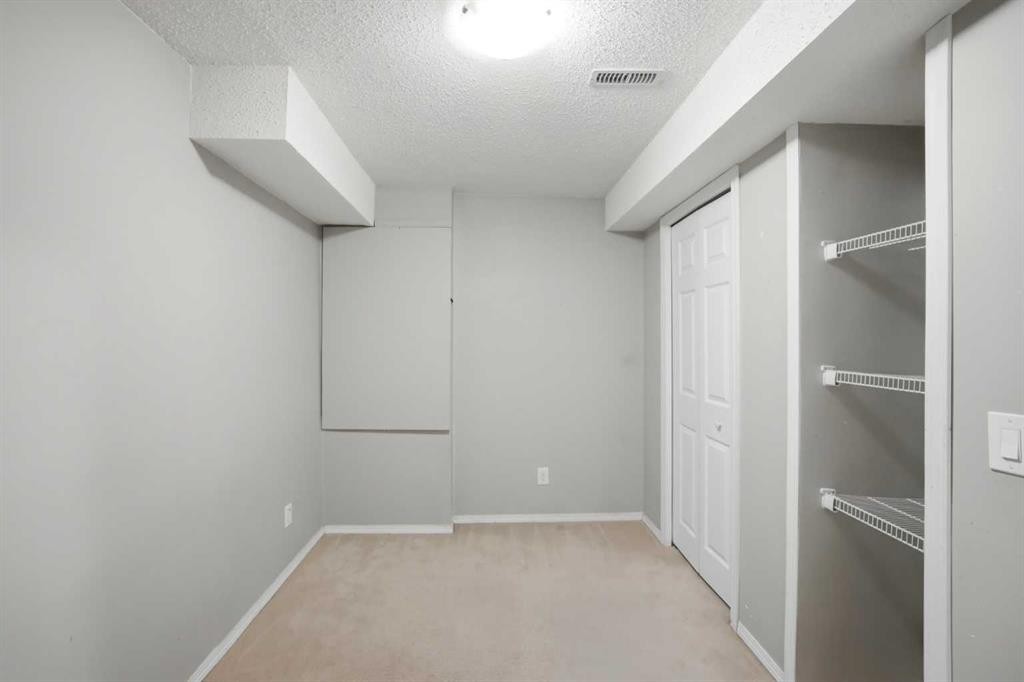 35 Saddlebrook Link Ne, Calgary, AB - Indoor Photo Showing Other Room