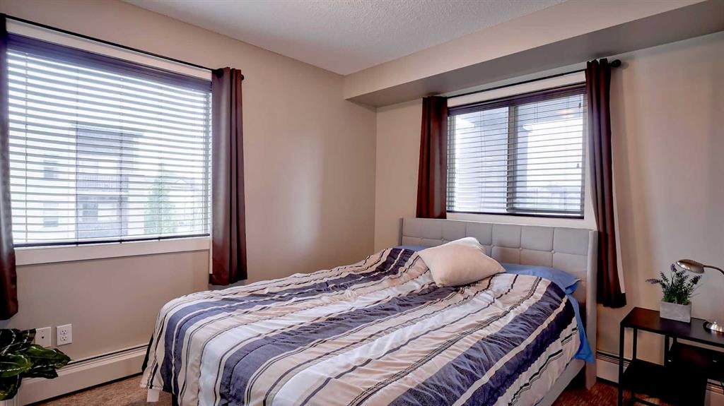 3309-403 Mackenzie Way Sw, Airdrie, AB