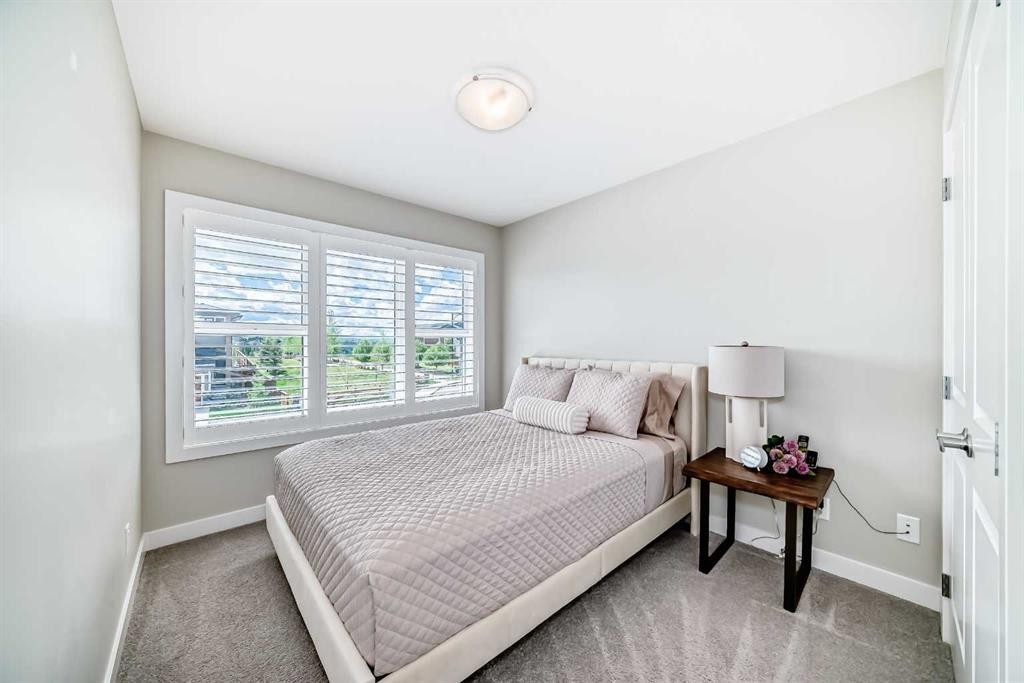 116 Precedence Way, Cochrane, AB - Indoor Photo Showing Bedroom