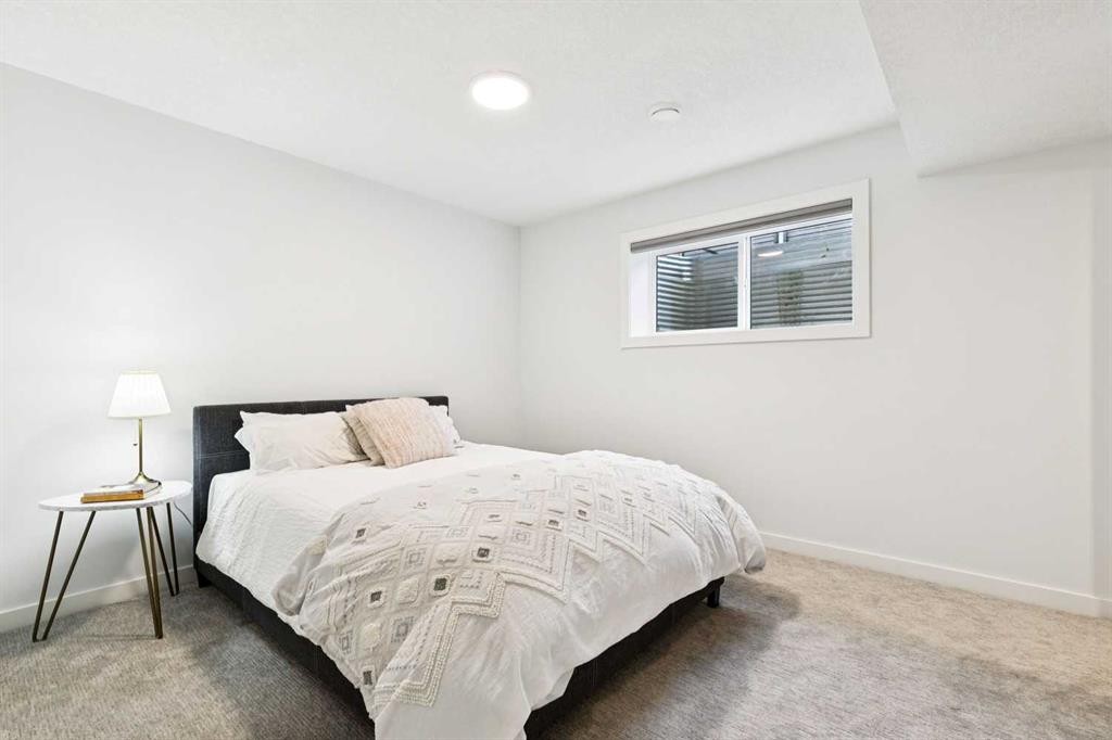 44 Creekside Boulevard Sw, Calgary, AB - Indoor Photo Showing Bedroom
