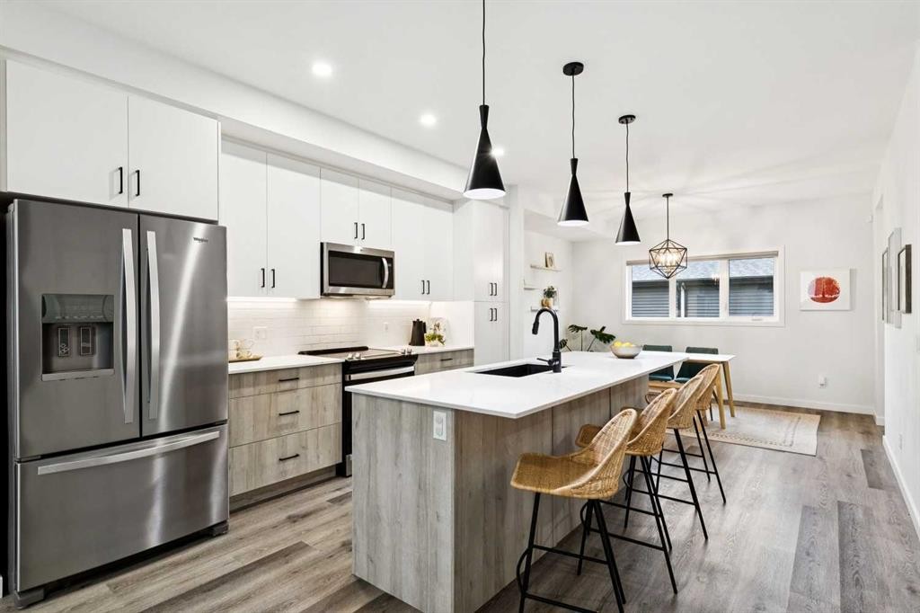 44 Creekside Boulevard Sw, Calgary, AB - Indoor Photo Showing Kitchen With Stainless Steel Kitchen With Upgraded Kitchen
