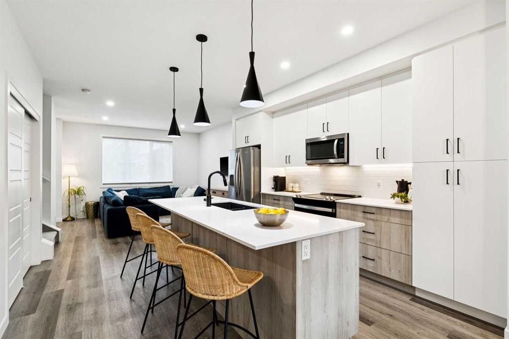 44 Creekside Boulevard Sw, Calgary, AB - Indoor Photo Showing Kitchen With Stainless Steel Kitchen With Upgraded Kitchen