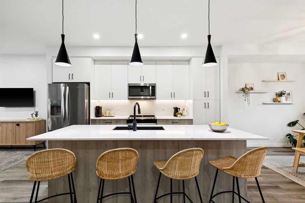 44 Creekside Boulevard Sw, Calgary, AB - Indoor Photo Showing Kitchen With Stainless Steel Kitchen With Upgraded Kitchen