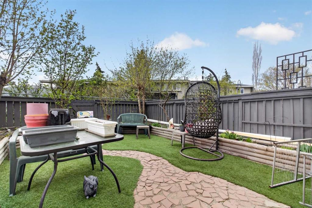 106-6223 31 Avenue Nw, Calgary, AB - Outdoor With Backyard
