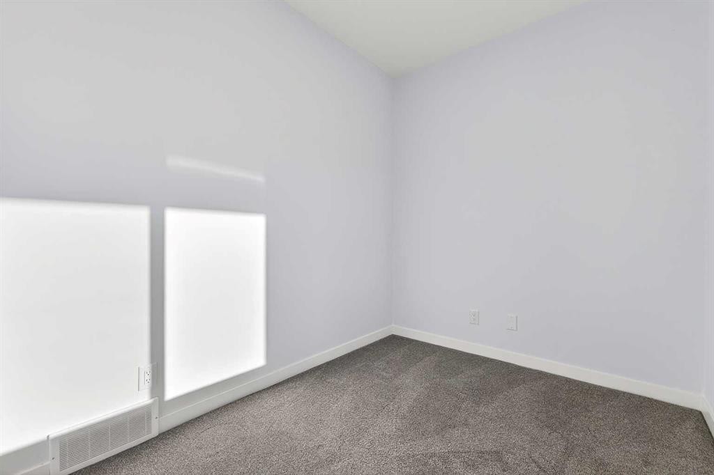 609-132 Red Embers Link Ne, Calgary, AB - Indoor Photo Showing Other Room