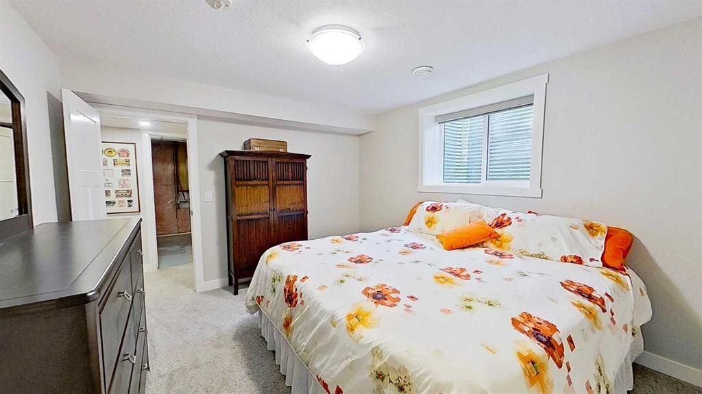 15 Echlin Court, Bragg Creek, AB - Indoor Photo Showing Bedroom
