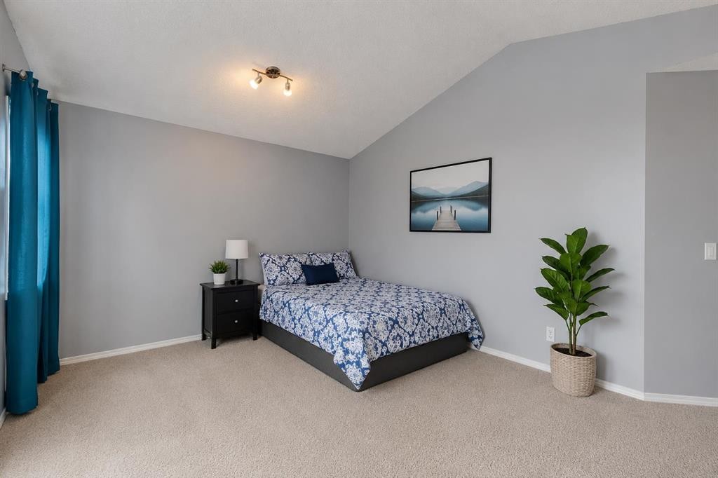47 Westmount Road, Okotoks, AB - Indoor Photo Showing Bedroom