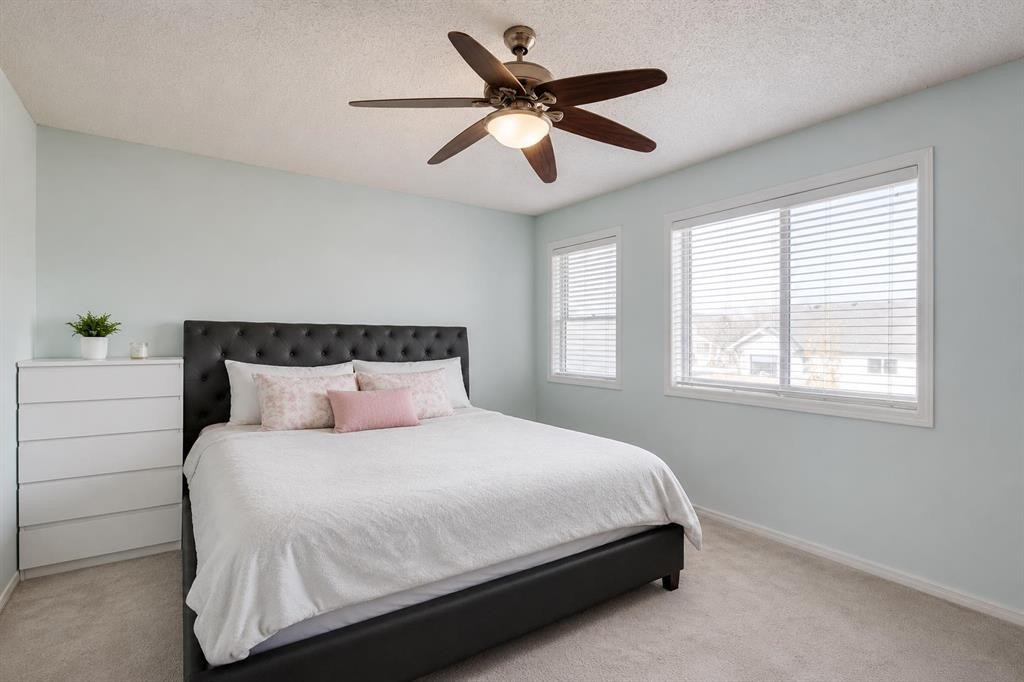 47 Westmount Road, Okotoks, AB - Indoor Photo Showing Bedroom