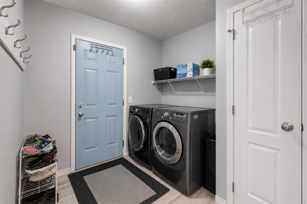 47 Westmount Road, Okotoks, AB - Indoor Photo Showing Laundry Room