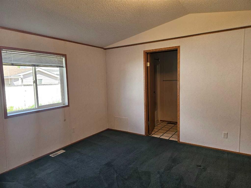 64 Westover Avenue, Claresholm, AB - Indoor Photo Showing Other Room