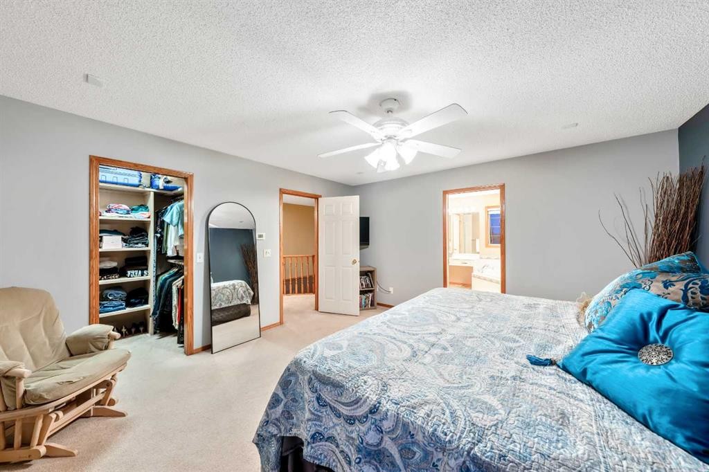 46 4 Street Ne, Langdon, AB - Indoor Photo Showing Bedroom