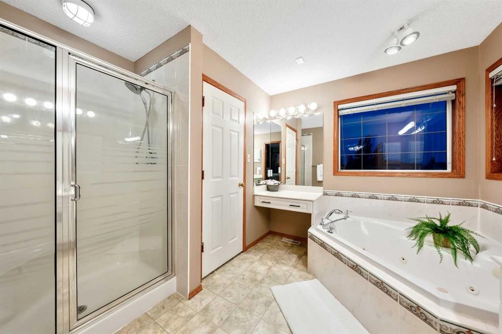 46 4 Street Ne, Langdon, AB - Indoor Photo Showing Bathroom