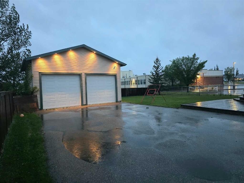 46 4 Street Ne, Langdon, AB - Outdoor
