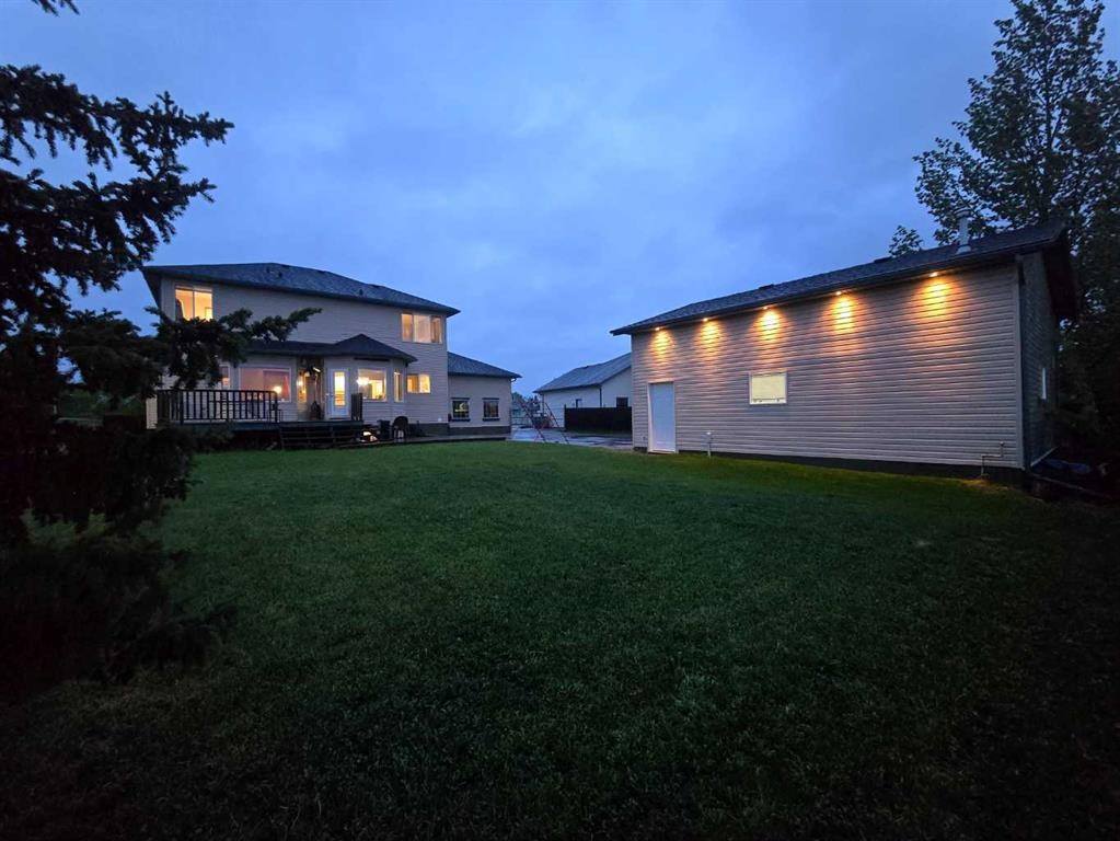 46 4 Street Ne, Langdon, AB - Outdoor With Deck Patio Veranda