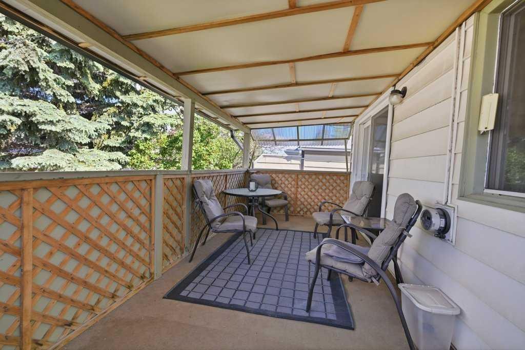 7115 Huntercrest Road Nw, Calgary, AB - Outdoor With Deck Patio Veranda With Exterior