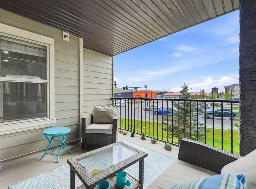 1219-625 Glenbow Drive, Cochrane, AB - Outdoor With Deck Patio Veranda With Exterior