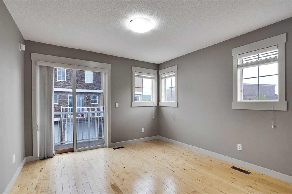 124 Lavender Link, Chestermere, AB - Indoor Photo Showing Other Room