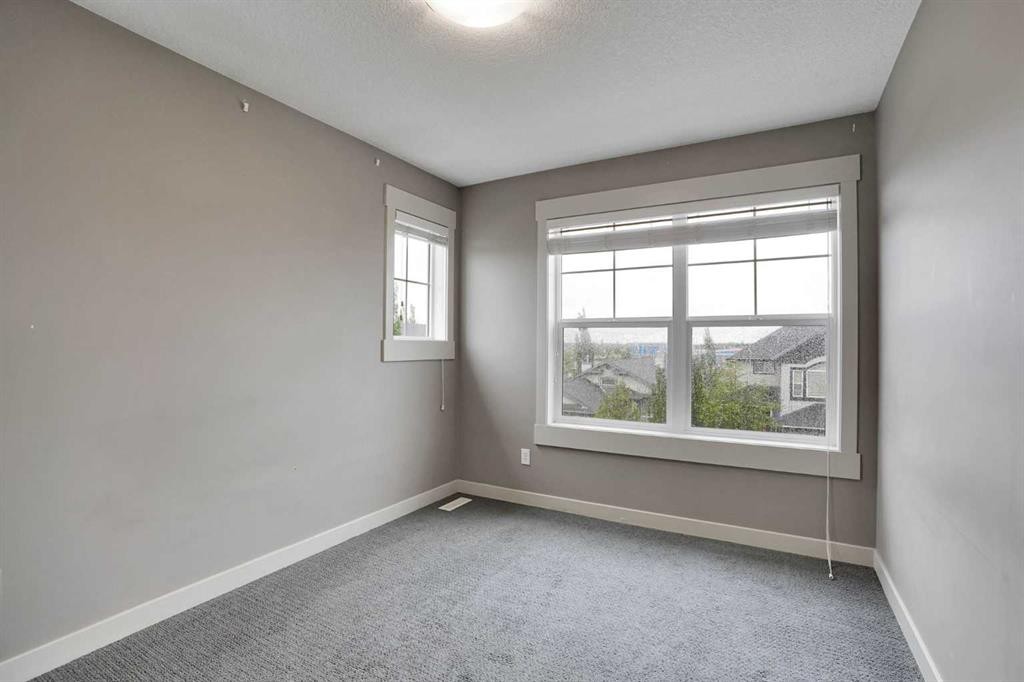 124 Lavender Link, Chestermere, AB - Indoor Photo Showing Other Room