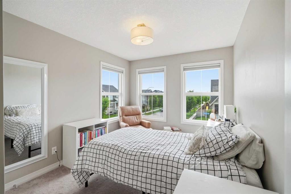6 Mahogany Lane Se, Calgary, AB - Indoor Photo Showing Bedroom