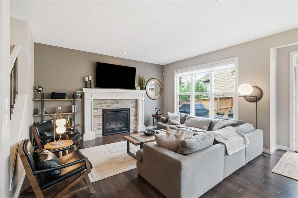 6 Mahogany Lane Se, Calgary, AB - Indoor Photo Showing Living Room With Fireplace