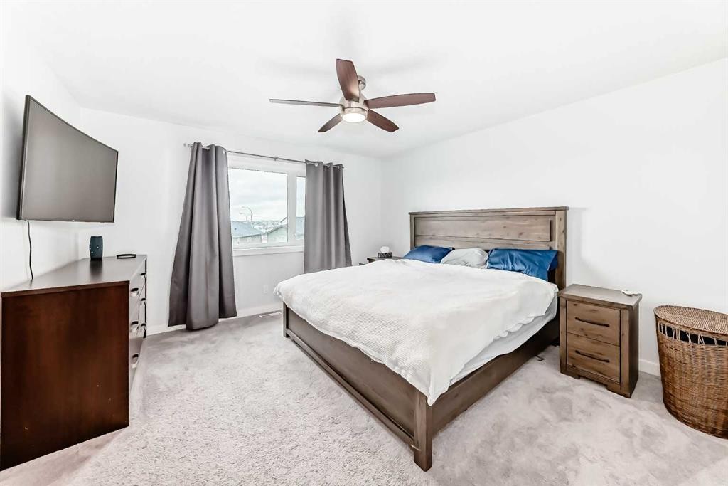 51 Evanscrest Way Nw, Calgary, AB - Indoor Photo Showing Bedroom