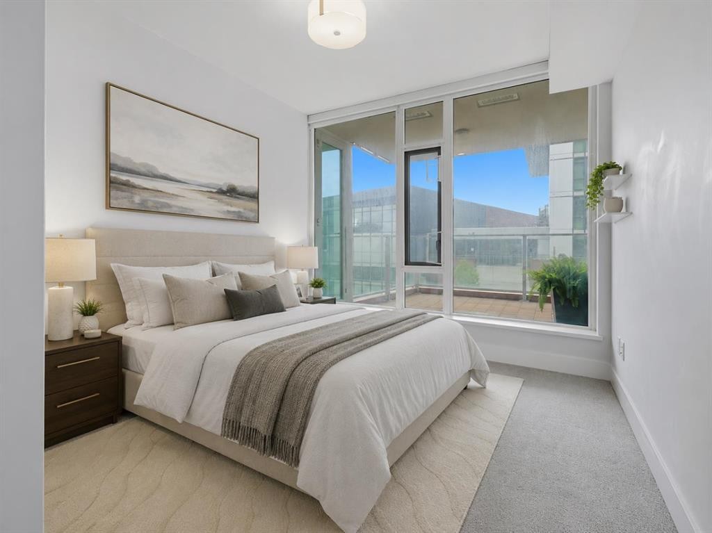 205-519 Riverfront Avenue Se, Calgary, AB - Indoor Photo Showing Bedroom