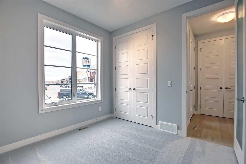 2085 Cobblespring Avenue Sw, Airdrie, AB - Indoor Photo Showing Other Room