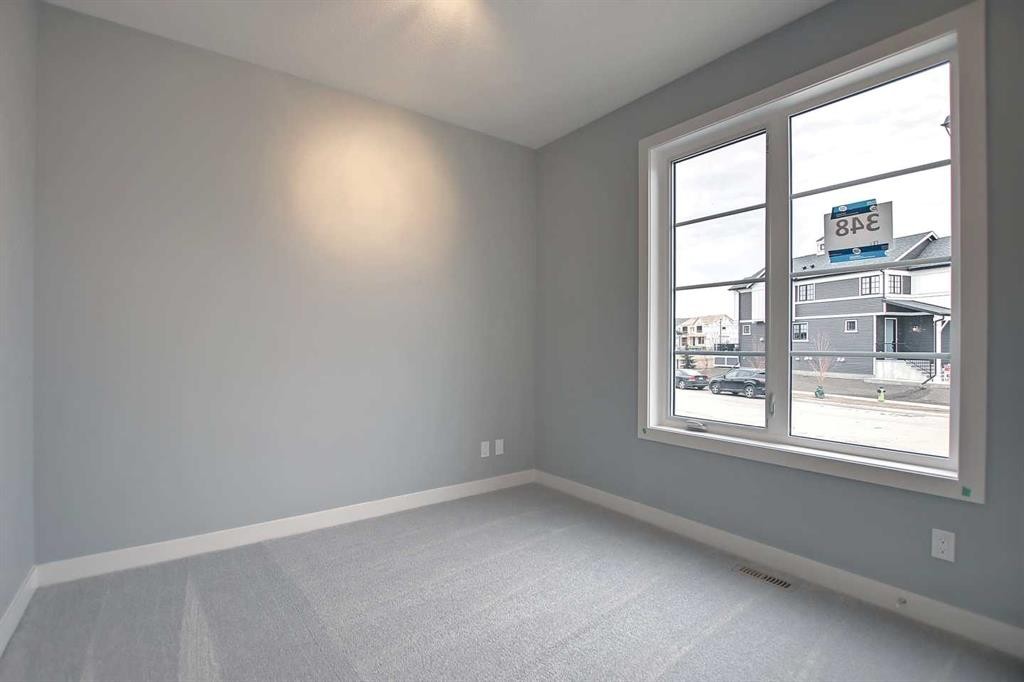 2085 Cobblespring Avenue Sw, Airdrie, AB - Indoor Photo Showing Other Room