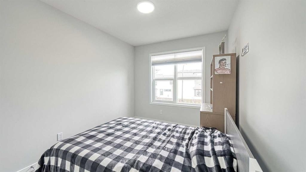 67 Setonstone Row Se, Calgary, AB - Indoor Photo Showing Bedroom
