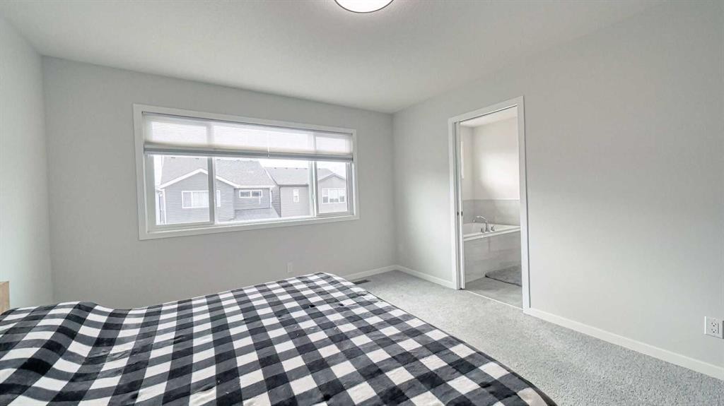 67 Setonstone Row Se, Calgary, AB - Indoor Photo Showing Bedroom