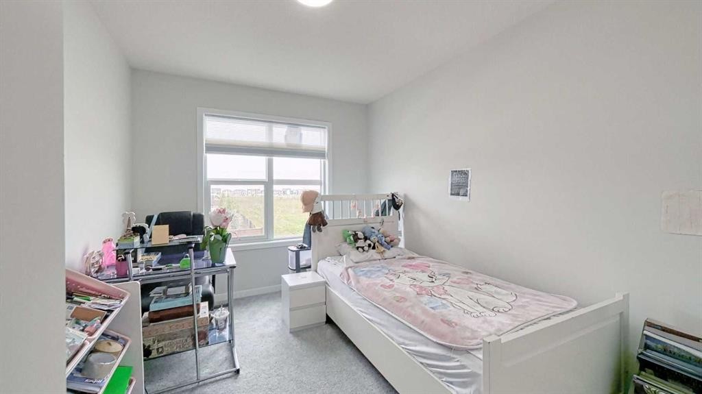 67 Setonstone Row Se, Calgary, AB - Indoor Photo Showing Bedroom